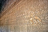 Angkor Wat temple, the bas-reliefs of the third enclosure. East Gallery Southern Part. Churning of the Ocean of Milk. 